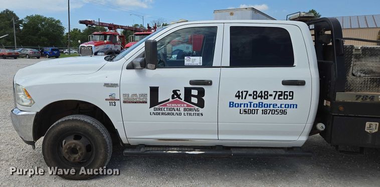 image for item ED2140 2014 Dodge Ram 3500 Crew Cab flatbed pickup truck