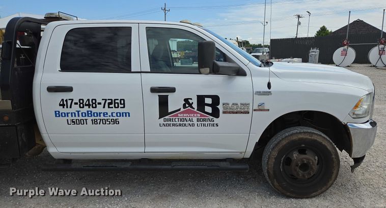 image for item ED2140 2014 Dodge Ram 3500 Crew Cab flatbed pickup truck