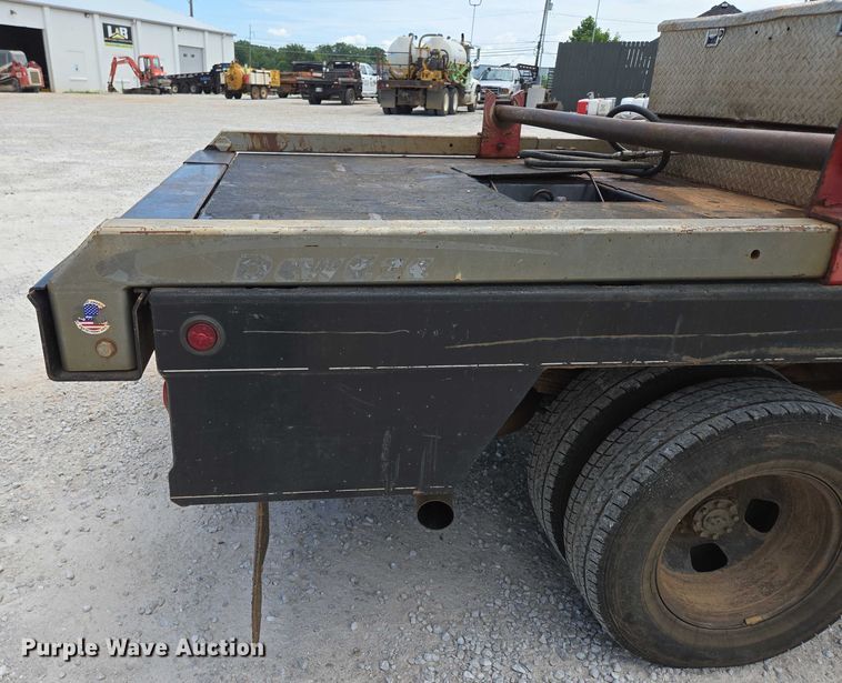 image for item ED2140 2014 Dodge Ram 3500 Crew Cab flatbed pickup truck