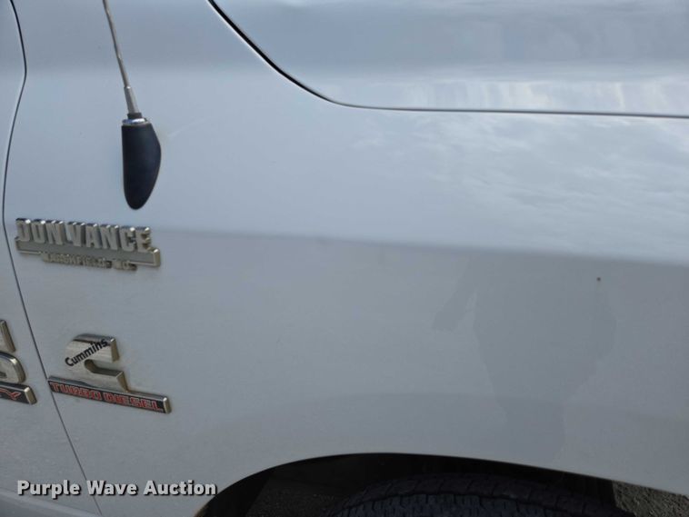 image for item ED2140 2014 Dodge Ram 3500 Crew Cab flatbed pickup truck