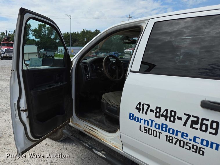 image for item ED2140 2014 Dodge Ram 3500 Crew Cab flatbed pickup truck