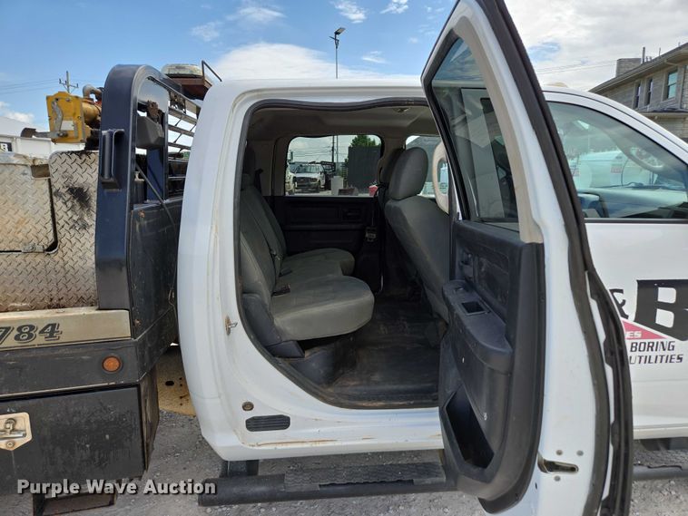 image for item ED2140 2014 Dodge Ram 3500 Crew Cab flatbed pickup truck