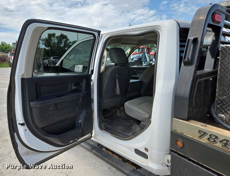 image for item ED2140 2014 Dodge Ram 3500 Crew Cab flatbed pickup truck