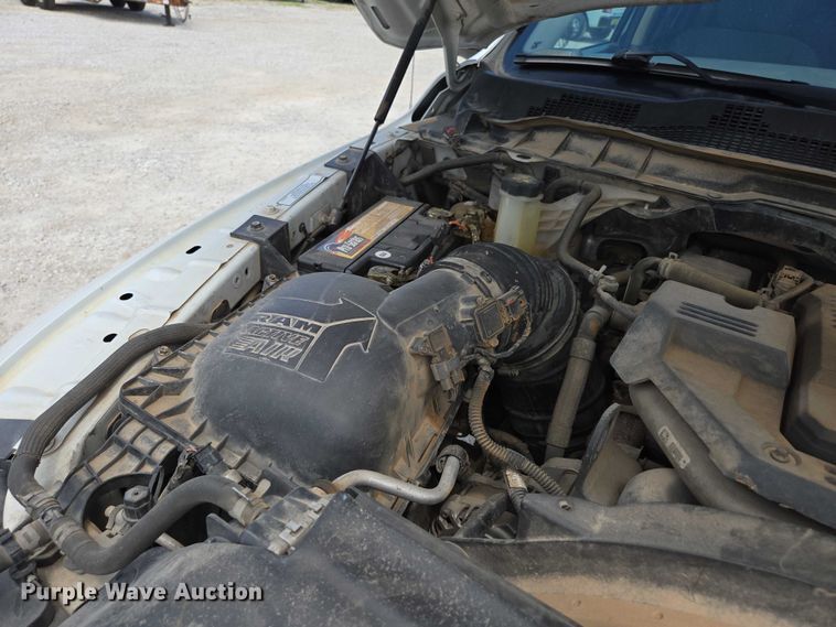 image for item ED2140 2014 Dodge Ram 3500 Crew Cab flatbed pickup truck