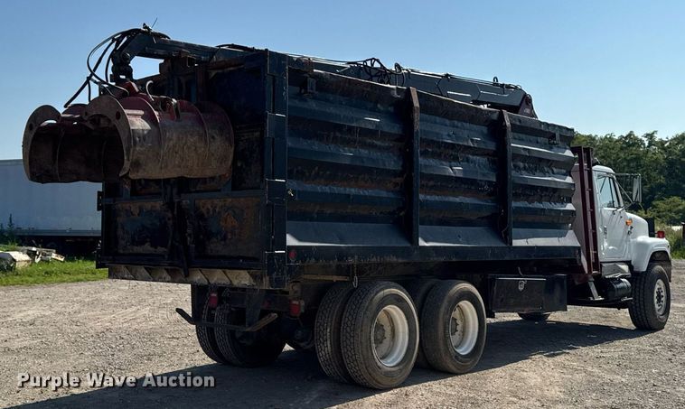 image for item EM2109 1999 International F-2574 grapple crane truck