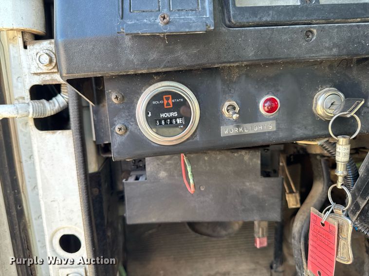 image for item EM2109 1999 International F-2574 grapple crane truck