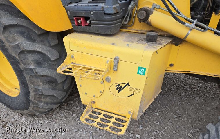 image for item EN8260 2002 New Holland LB75B backhoe
