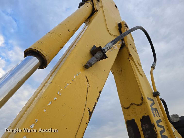 image for item EN8260 2002 New Holland LB75B backhoe