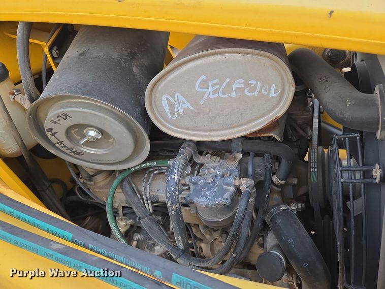 image for item EN8260 2002 New Holland LB75B backhoe