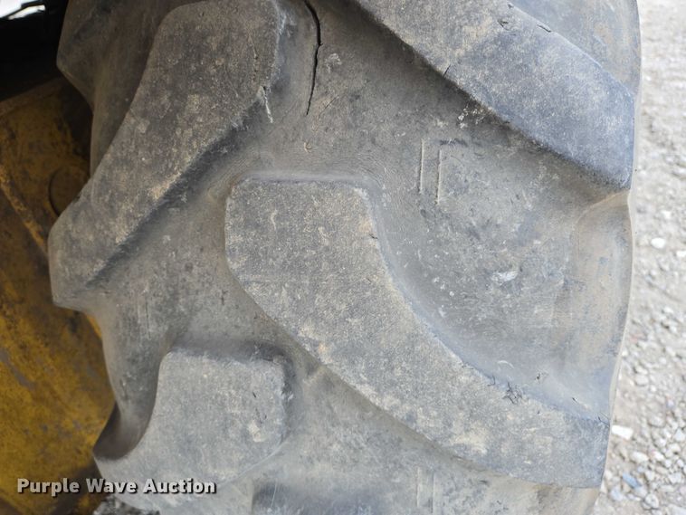 image for item EN8260 2002 New Holland LB75B backhoe