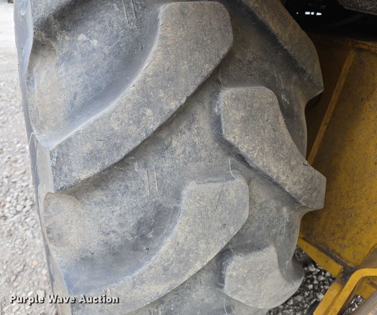 image for item EN8260 2002 New Holland LB75B backhoe