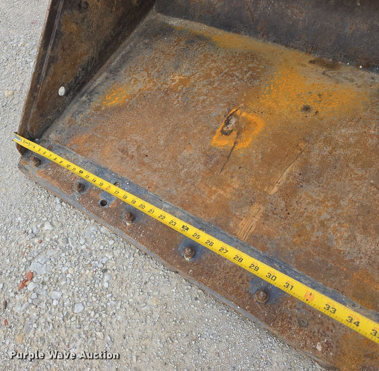 image for item EO1091 4 skid steer buckets