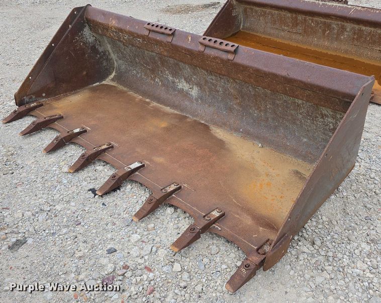 image for item EO1091 4 skid steer buckets