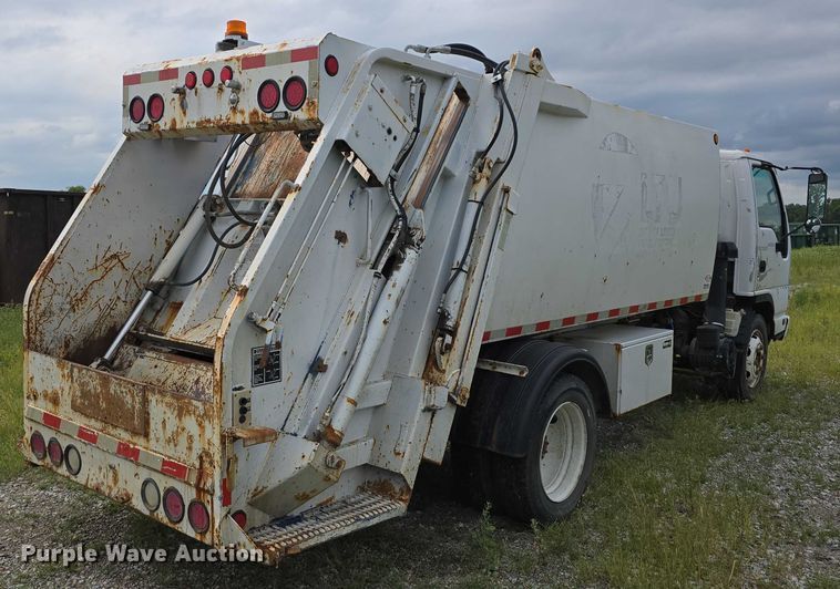 image for item DR3906 2006 GMC W5 refuse truck