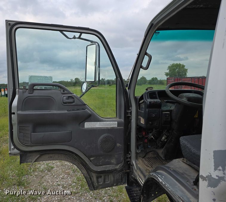 image for item DR3906 2006 GMC W5 refuse truck