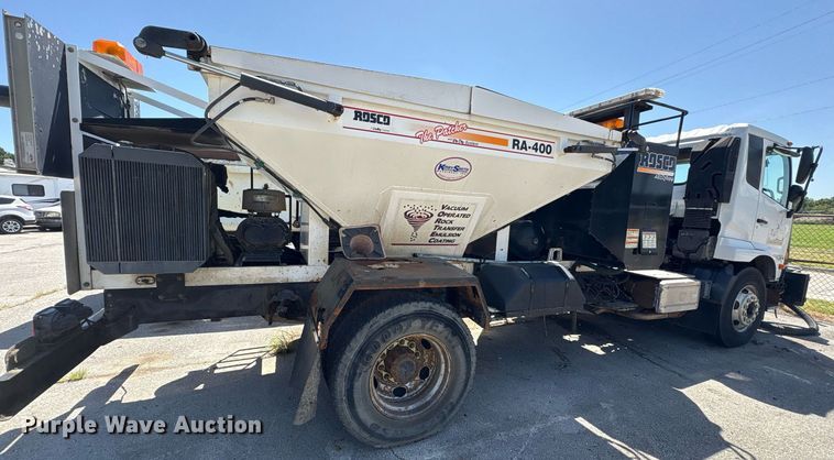 image for item EG8573 2012 Nissan UD3300 pothole patcher truck