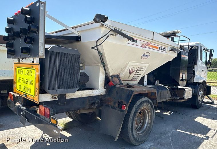 image for item EG8573 2012 Nissan UD3300 pothole patcher truck