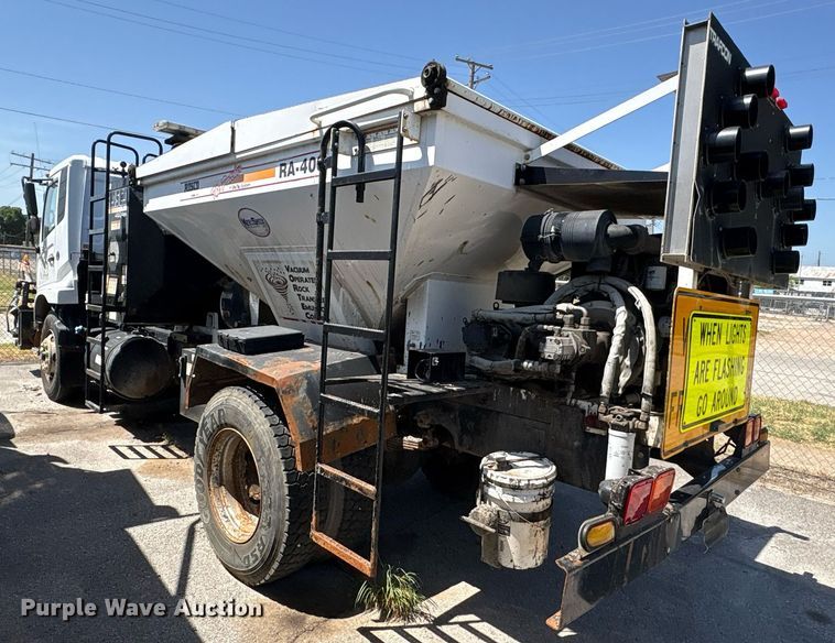 image for item EG8573 2012 Nissan UD3300 pothole patcher truck