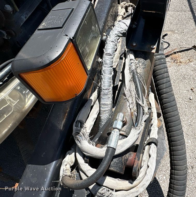 image for item EG8573 2012 Nissan UD3300 pothole patcher truck