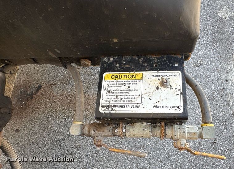 image for item EG8573 2012 Nissan UD3300 pothole patcher truck