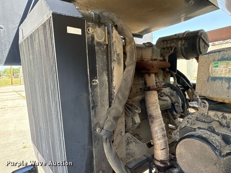 image for item EG8573 2012 Nissan UD3300 pothole patcher truck