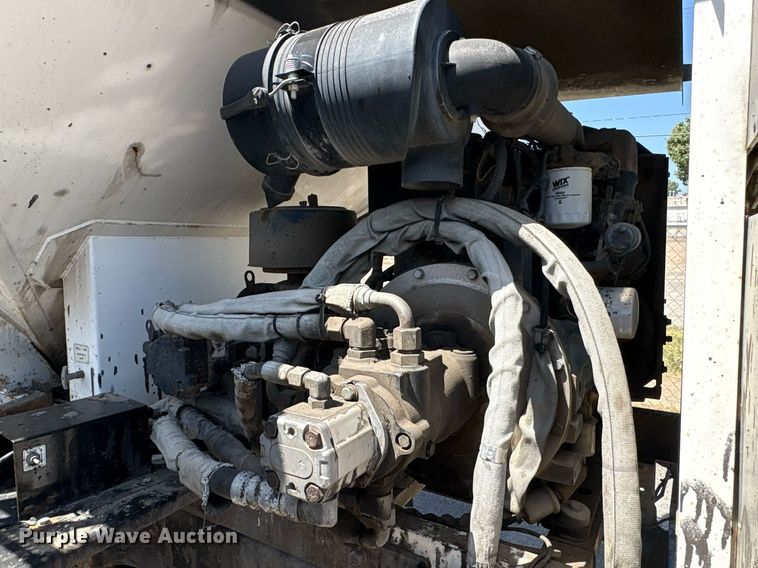 image for item EG8573 2012 Nissan UD3300 pothole patcher truck