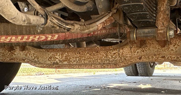 image for item EG8573 2012 Nissan UD3300 pothole patcher truck