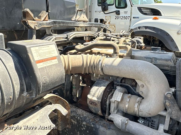 image for item EG8573 2012 Nissan UD3300 pothole patcher truck