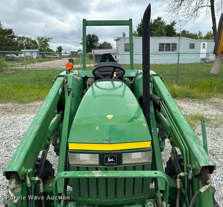 image for item EM2164 1997 John Deere 1070 MFWD tractor