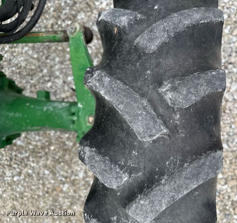 image for item EM2164 1997 John Deere 1070 MFWD tractor