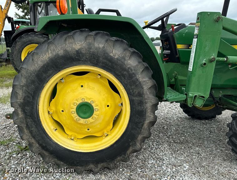 image for item EM2164 1997 John Deere 1070 MFWD tractor