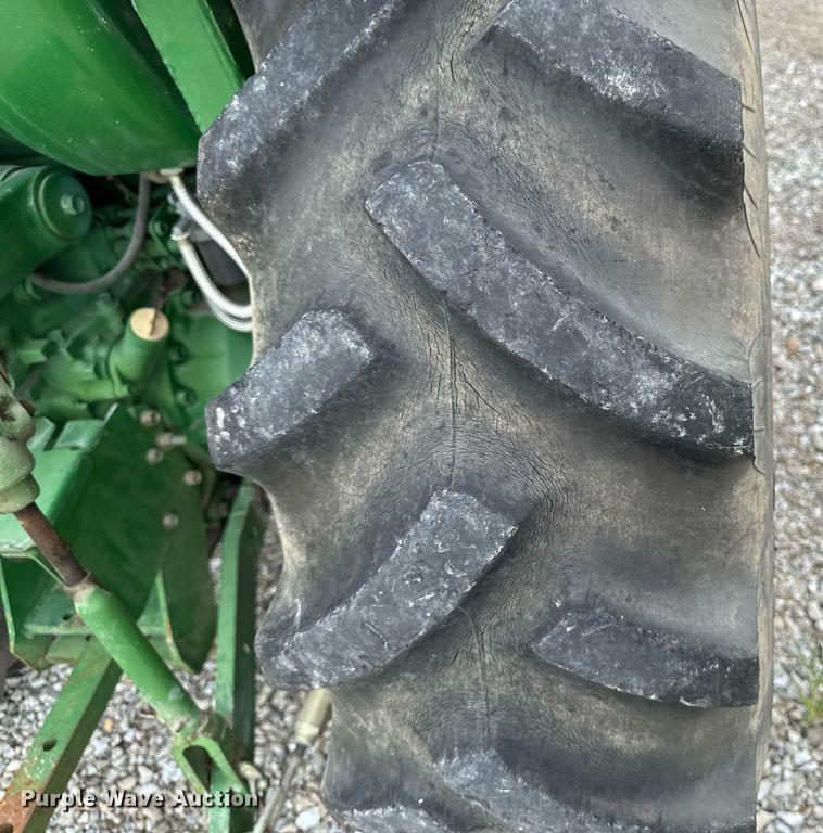 image for item EM2164 1997 John Deere 1070 MFWD tractor