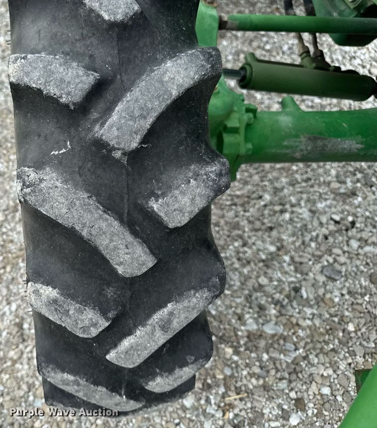 image for item EM2164 1997 John Deere 1070 MFWD tractor