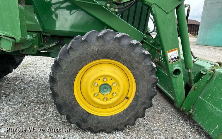 image for item EM2164 1997 John Deere 1070 MFWD tractor