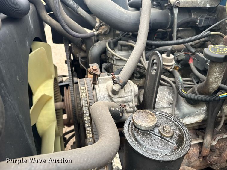 image for item ER2179 1995 Ford F700 flatbed truck