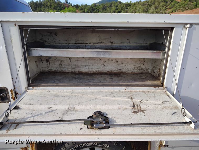 image for item IP9636 2011 Dodge Ram 2500HD Crew Cab utility bed pickup truck