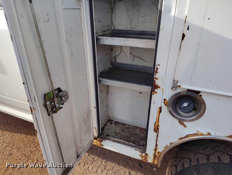 image for item IP9636 2011 Dodge Ram 2500HD Crew Cab utility bed pickup truck