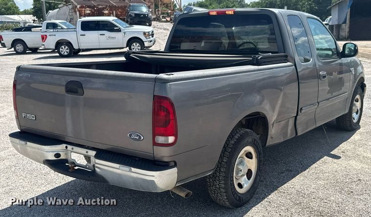 image for item NX9325 2002 Ford F150 SuperCab pickup truck