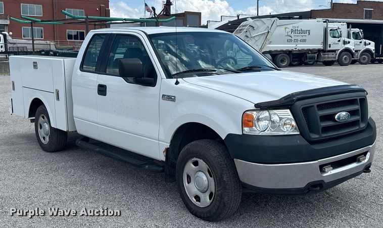image for item NX9339 2006 Ford F150 SuperCab utility bed pickup truck