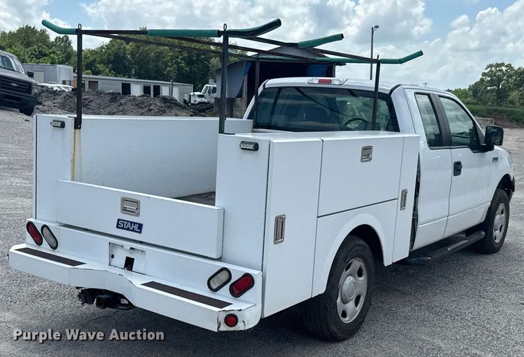 image for item NX9339 2006 Ford F150 SuperCab utility bed pickup truck