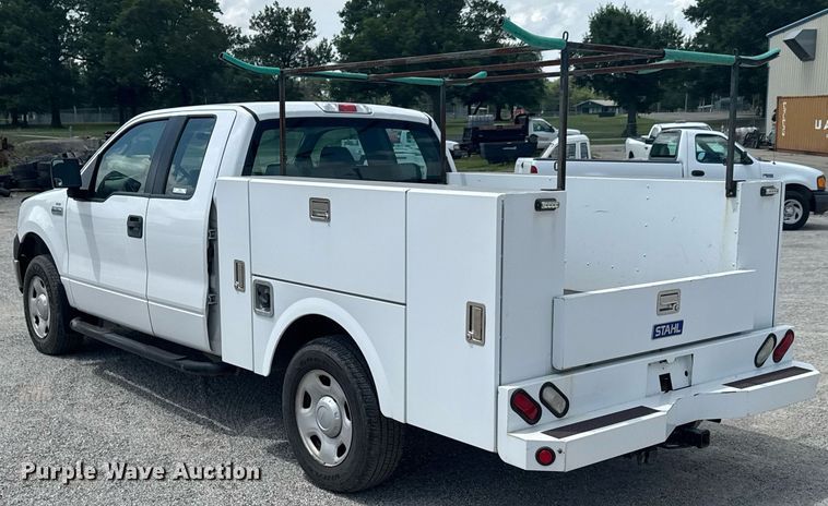 image for item NX9339 2006 Ford F150 SuperCab utility bed pickup truck