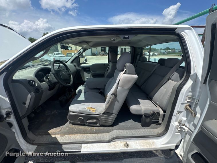 image for item NX9339 2006 Ford F150 SuperCab utility bed pickup truck