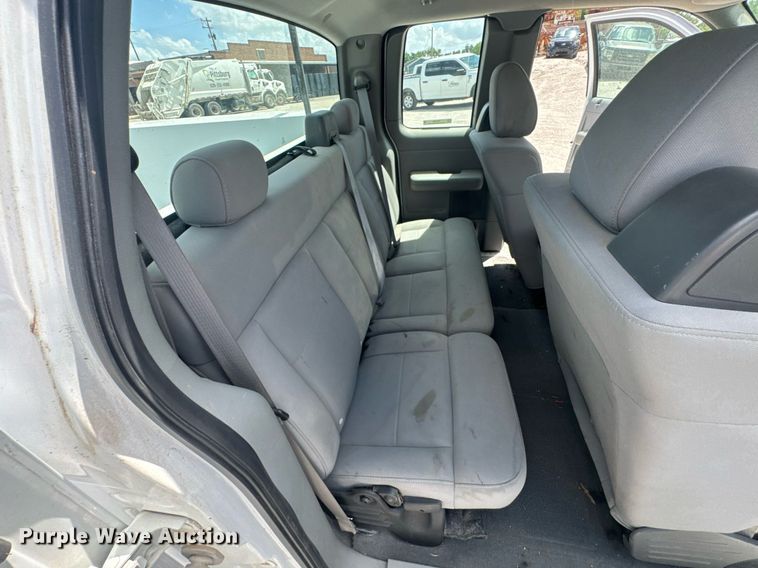 image for item NX9339 2006 Ford F150 SuperCab utility bed pickup truck