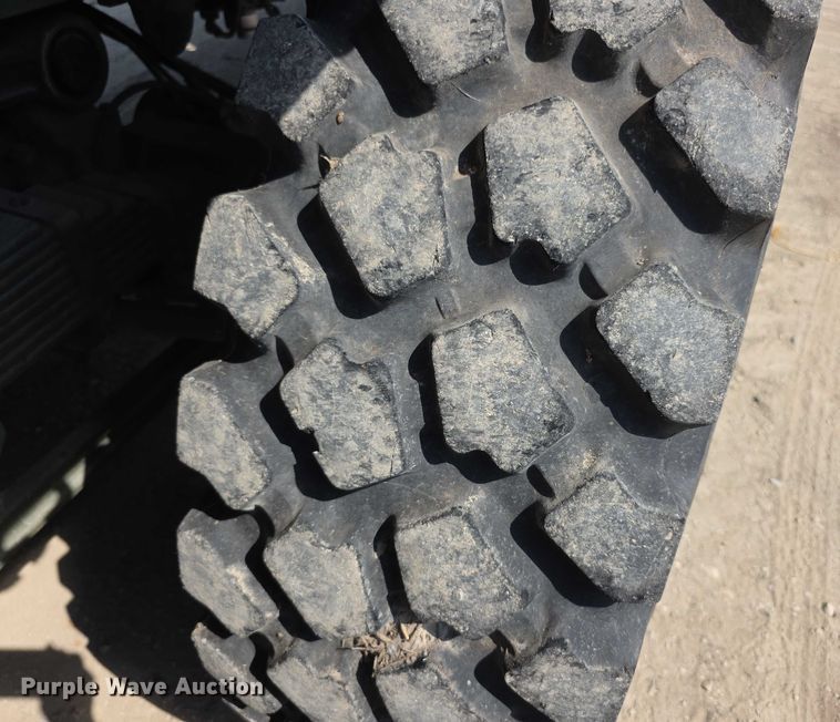 image for item EF3630 1990 BMY 5 Ton M923A2  flatbed truck