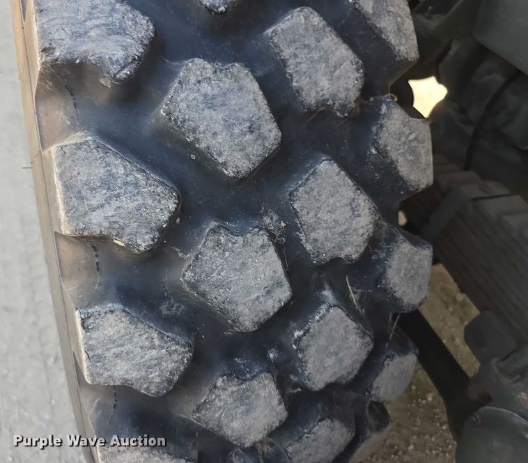 image for item EF3630 1990 BMY 5 Ton M923A2  flatbed truck