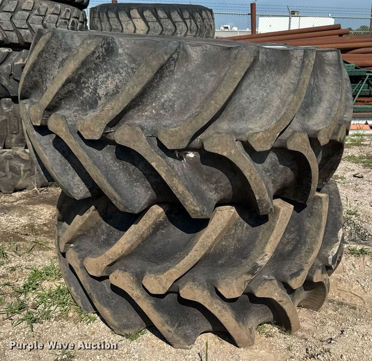 image for item EM2132 (2) Firestone Champion 28L-26 tires and wheels