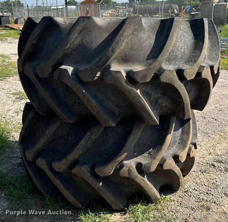 image for item EM2132 (2) Firestone Champion 28L-26 tires and wheels