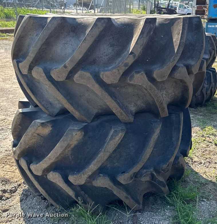 image for item EM2132 (2) Firestone Champion 28L-26 tires and wheels