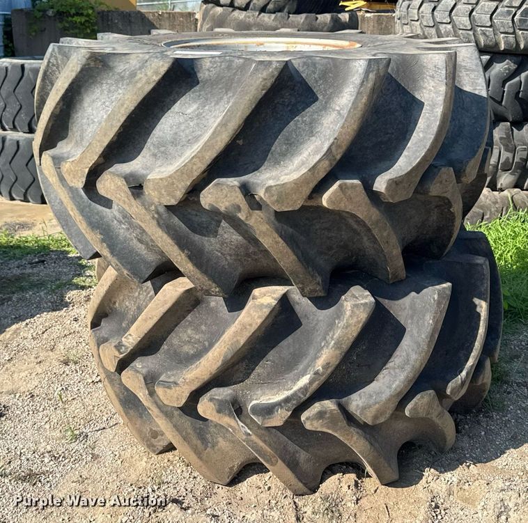 image for item EM2132 (2) Firestone Champion 28L-26 tires and wheels