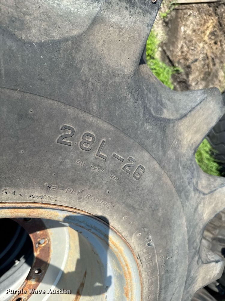 image for item EM2132 (2) Firestone Champion 28L-26 tires and wheels